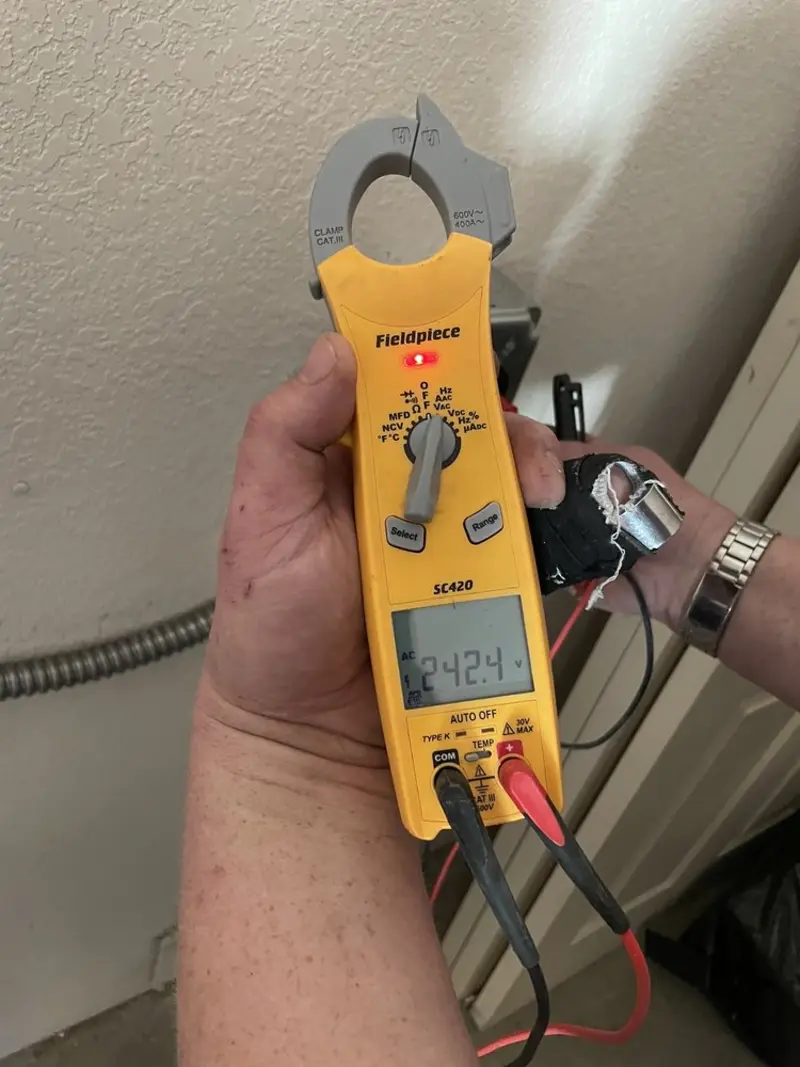 Voltage testing with clamp meter during Circuit Breaker Repair in Castleton